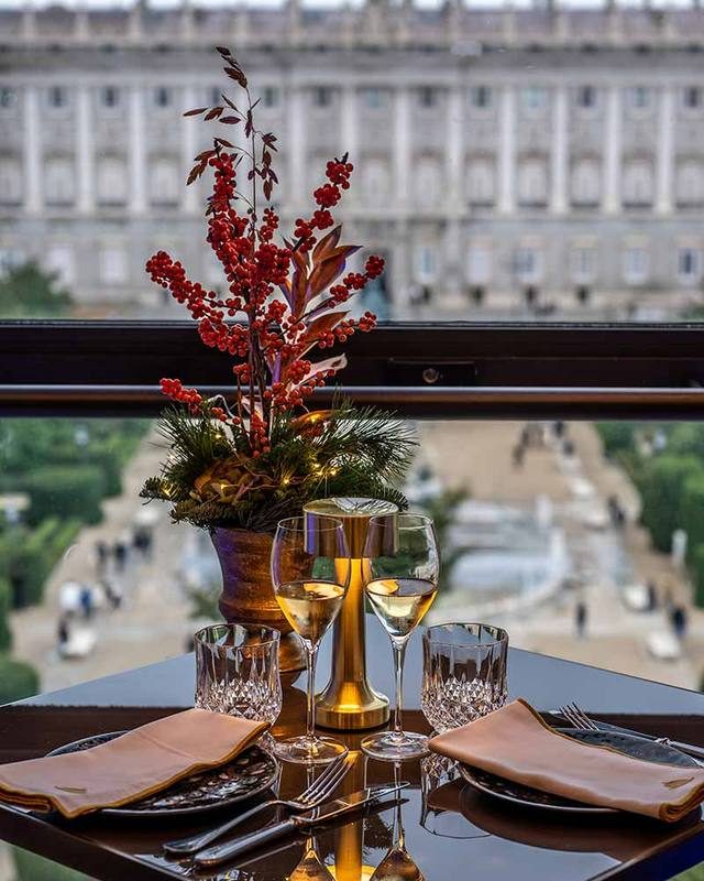 Christmas table by the window, with the Royal Palace across the square